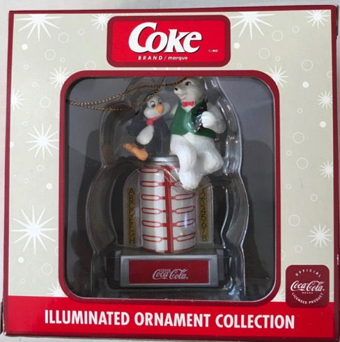 04505-1 € 12,50 coca cola ornament kan op lichtnsoer aangesloten worden beer en pinguin op wallbox.jpeg